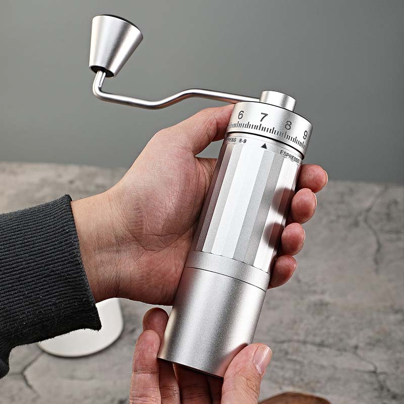 A manual coffee grinder demonstrating the effect of precision grinding